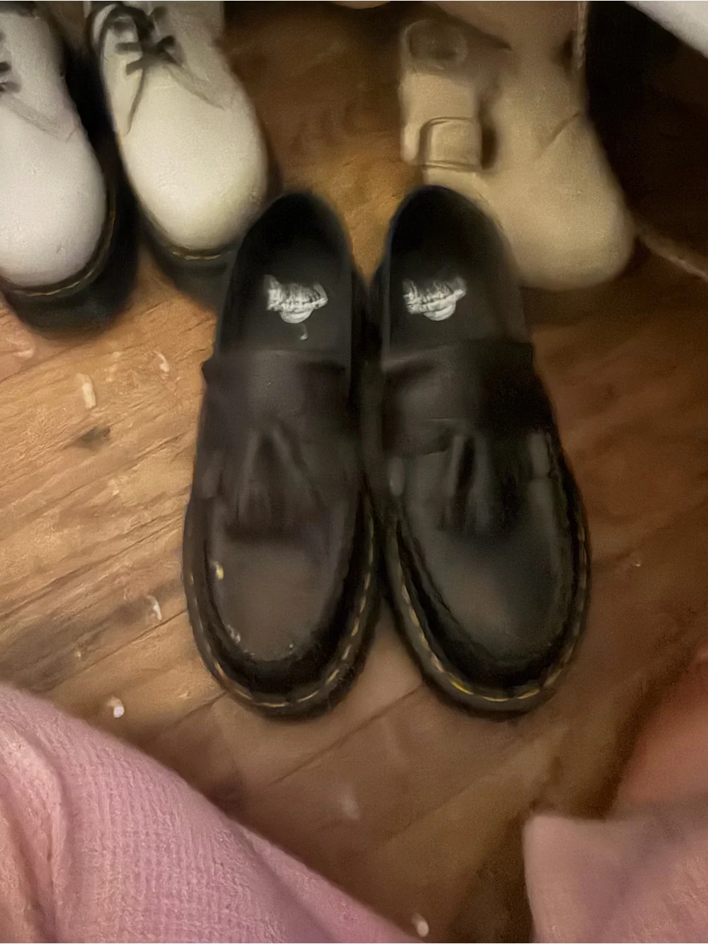 Dr. Martens Black Tassel Kiltie Loafers with Yellow Welt Stitching